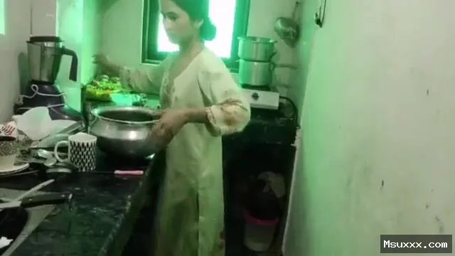 Hot Kamwali's Blowjob Video is working in the kitchen